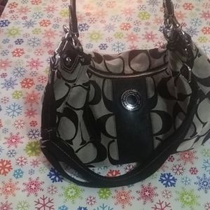 Authentic Coach hobo bag with crossbody strap.